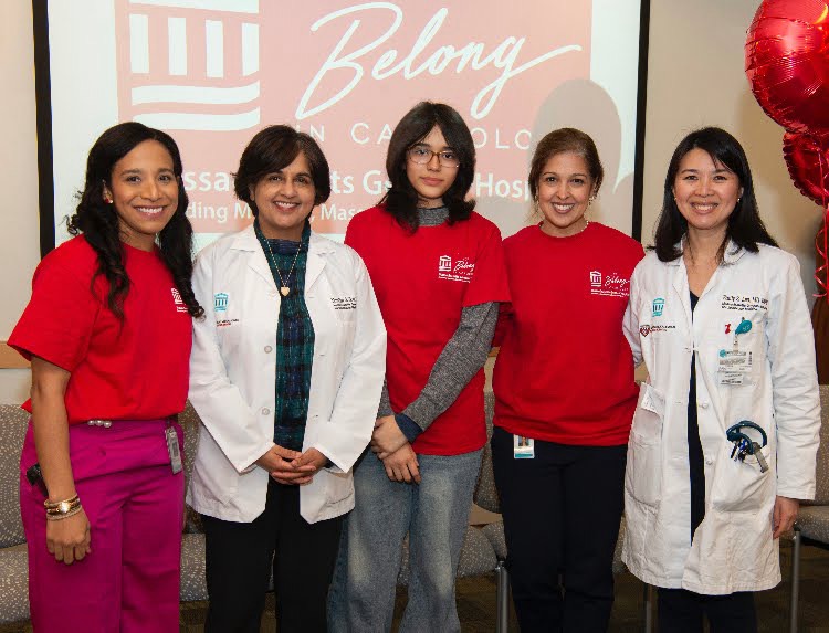 Sophia Vasquez pictured with staff members from MGH in a group photo